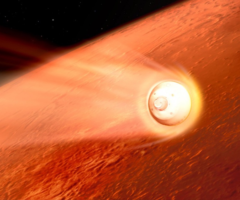 In this illustration of its descent to Mars, the spacecraft containing NASA’s Perseverance rover slows down in the Martian atmosphere